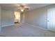 Large bedroom with neutral carpet and ceiling fan at 403 Sandown Dr, Peachtree City, GA 30269