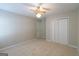 Spacious bedroom with carpeting, a ceiling fan and closet; providing comfort and convenience at 403 Sandown Dr, Peachtree City, GA 30269