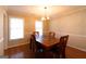 Traditional dining room with chandelier, table and chairs at 403 Sandown Dr, Peachtree City, GA 30269