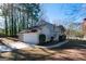 Well-maintained home with an attached two-car garage and a long driveway at 403 Sandown Dr, Peachtree City, GA 30269