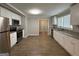 Modern kitchen with stainless steel appliances and plenty of counter space at 245 Carole Dr, Oxford, GA 30054