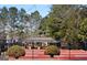 Community basketball court with shelter and benches, perfect for outdoor recreation at 7491 Hilltop Way, Atlanta, GA 30349