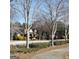 Charming neighborhood street view, showcasing well-kept homes and community amenities at 7491 Hilltop Way, Atlanta, GA 30349