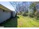 Backyard featuring grass, trees, and the side of the house at 1393 Vesta Ave, Atlanta, GA 30344