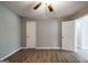 Bedroom featuring hardwood floors, neutral colored walls, and white trim at 1393 Vesta Ave, Atlanta, GA 30344