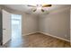 Large bedroom boasting hardwood floors and neutral colored walls at 1393 Vesta Ave, Atlanta, GA 30344