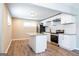 Updated kitchen featuring stainless steel appliances, an island and granite countertops at 1393 Vesta Ave, Atlanta, GA 30344