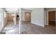 Open floor plan featuring a living room leading to a modern kitchen, with a breakfast bar at 1393 Vesta Ave, Atlanta, GA 30344