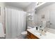 Bathroom with shower-tub combo and vanity with storage at 423 Holly Grove Church Rd, Peachtree City, GA 30269