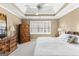 Bedroom features neutral decor, and a ceiling fan for year-round comfort at 423 Holly Grove Church Rd, Peachtree City, GA 30269