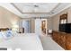 Bedroom with ensuite bathroom features soft lighting and ceiling fan at 423 Holly Grove Church Rd, Peachtree City, GA 30269