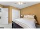 Bedroom featuring a queen bed with a dark wood frame, carpet and closet at 423 Holly Grove Church Rd, Peachtree City, GA 30269