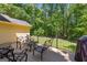 Wooden deck overlooking private backyard at 423 Holly Grove Church Rd, Peachtree City, GA 30269