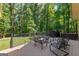 Wooden deck with patio seating and a gas grill at 423 Holly Grove Church Rd, Peachtree City, GA 30269