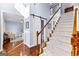 Elegant entryway with a staircase and barn door leading to another room at 423 Holly Grove Church Rd, Peachtree City, GA 30269
