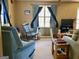 Comfortable living room with natural light, cozy seating, and a relaxed ambiance at 924 Polk Rd, Moreland, GA 30259