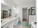 Bright bathroom with double sinks, and a separate shower and tub at 3225 Alhambra Cir, Hampton, GA 30228