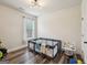 Bedroom space with modern flooring, natural light, and a play area at 3225 Alhambra Cir, Hampton, GA 30228