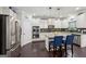 Kitchen with granite countertops, stainless steel appliances, hardwood floors, and a pantry at 3225 Alhambra Cir, Hampton, GA 30228