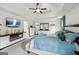 Inviting bedroom featuring a flat-screen television and a comfortable bed at 3225 Alhambra Cir, Hampton, GA 30228