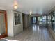 Relaxing sunroom with tile flooring and lots of windows providing ample sunlight at 4889 Wedgewood Way, Stone Mountain, GA 30088