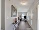 Entryway leading into a living room, featuring a console table, and modern decor at 912 Shadow Ridge Cir, Stockbridge, GA 30281