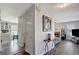 Inviting living room showcases a seamless view into the kitchen and features sleek, gray-toned flooring at 912 Shadow Ridge Cir, Stockbridge, GA 30281