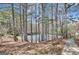 Community tennis courts nestled among trees providing shaded recreation at 912 Shadow Ridge Cir, Stockbridge, GA 30281