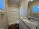 Bathroom featuring a shower, vanity with granite countertop, and a large mirror at 2987 Landmark Se Dr, Conyers, GA 30094