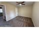 Spacious bedroom featuring carpet flooring and ample natural light from the window at 2987 Landmark Se Dr, Conyers, GA 30094