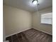 Bedroom featuring neutral paint, carpet flooring, and a window with blinds at 2987 Landmark Se Dr, Conyers, GA 30094