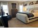 Inviting main bedroom featuring a comfortable bed, neutral tones, and natural light at 275 Nutt Dr, Locust Grove, GA 30248