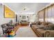 Inviting living room featuring neutral decor, wood flooring, and ample seating at 1055 Adrian Sw Cir, Conyers, GA 30094