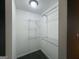 This walk-in closet features built-in shelving at 2795 Oxford Dr, Decatur, GA 30034