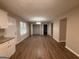 Dining space with hardwood floors, ample lighting, and access to additional rooms in the home at 2795 Oxford Dr, Decatur, GA 30034