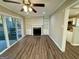 Inviting living room with a fireplace, built-in shelves, and sliding glass doors at 1380 Margarette Dr, Decatur, GA 30035