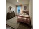 Charming bedroom featuring patterned rug, twin-sized bed, and coordinated decor at 235 Ivey Ter # 40, Temple, GA 30179