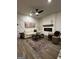 Comfortable living room with a modern electric fireplace, unique accent wall, and stylish furnishings at 235 Ivey Ter # 40, Temple, GA 30179