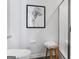 Modern bathroom featuring stylish art, wood stool, and glass shower in a neutral color palette at 237 Ivey Ter # 41, Temple, GA 30179