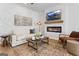 Cozy living room featuring a modern fireplace, plush sofa, and stylish decor for relaxed living at 237 Ivey Ter # 41, Temple, GA 30179