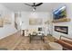 Comfortable living room with fireplace, stylish décor, and open access to a staircase and dining area at 237 Ivey Ter # 41, Temple, GA 30179