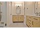 Bright bathroom featuring double vanity, stylish mirror, and built in shelving at 400 Murry Park, Peachtree City, GA 30269