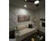 Comfortable living room featuring a sofa, modern decor, and a decorative wall at 243 Ivey Ter # 43, Temple, GA 30179