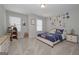 Bright bedroom featuring an alphabet wall design, carpet floors, and a cozy single bed at 2851 Fareed St, Douglasville, GA 30135