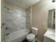 Bathroom with shower-tub combo and vanity, offers a clean and functional space for daily routines at 6220 Grovener Ave, Douglasville, GA 30134