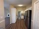 Functional kitchen features sleek appliances, ample counter space, and seamless transition to living, creating a welcoming atmosphere at 6220 Grovener Ave, Douglasville, GA 30134