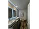 Bathroom showcasing a double vanity with granite countertops, vessel sinks, and decorative mirrors at 231 Ivey Ter # 47, Temple, GA 30179