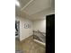 Upstairs hallway featuring a staircase at 231 Ivey Ter # 47, Temple, GA 30179