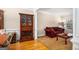 Elegant living room area with hardwood floors, comfortable seating, and stylish decor, perfect for relaxation at 9800 Ivey Ridge Cir, Jonesboro, GA 30238
