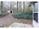 Backyard featuring a small shed in the distance and a patio at 3821 Rex Mill Sq, Rex, GA 30273